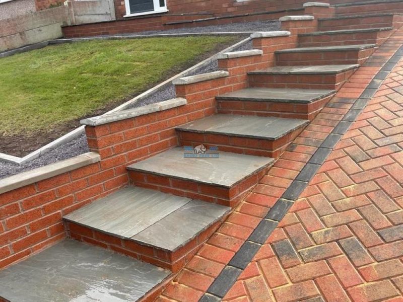 Block Paved Driveway with Retaining Wall and Indian Sandstone Steps in Holywell 4.jpeg