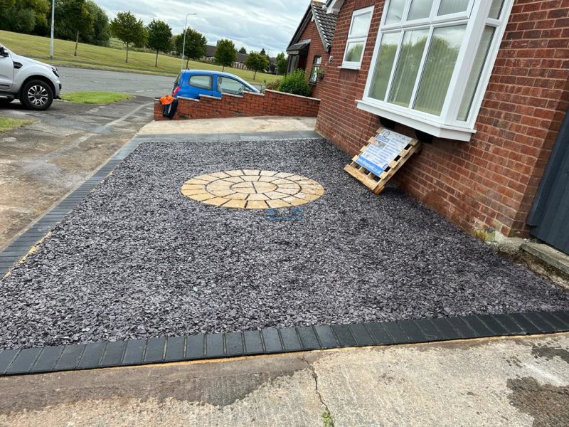 Rhino pave front patio with buff paved circle slate gravel and charcoal edges in chester cheshire 8.jpeg