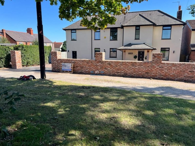 Rhino pave gravelled driveway with charcoal edging apron and retaining wall in deeside flintshire 9.jpeg