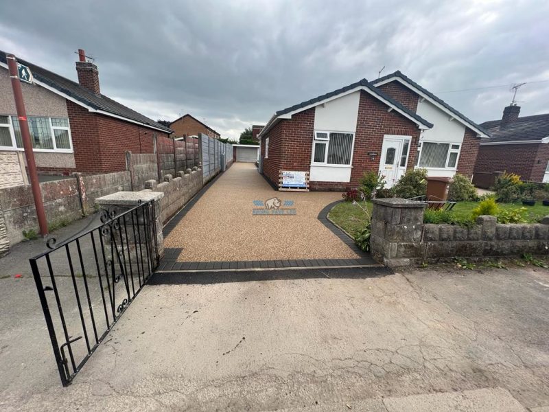 Rhino pave resin bound driveway with charcoal edging and grey sandstone patio and pathway in buckley flintshire 8.jpeg